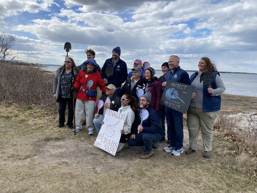 Mass Audubon employees posing for a congratulatory picture after learning of approval of the new horseshoe crab regulations